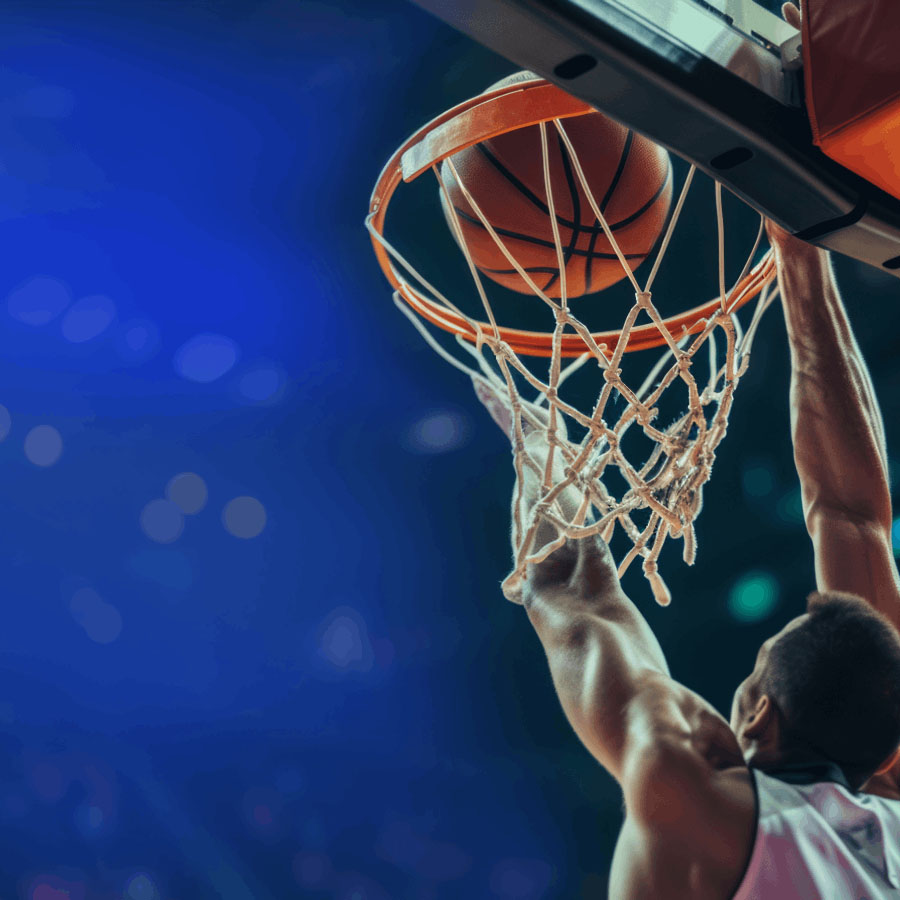 basketball athlete shooting ball into hoop